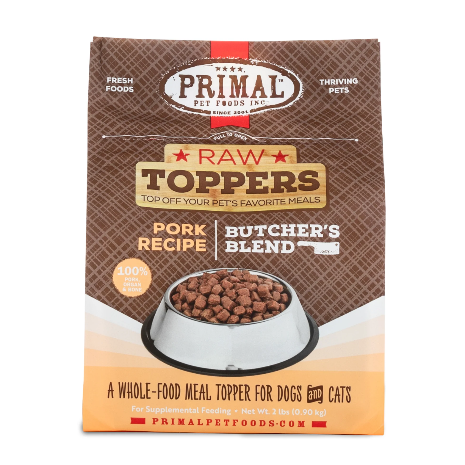 Front of a Primal Pet Foods Raw Toppers bag labeled “Pork Recipe Butcher’s Blend,” featuring a bowl filled with small cube-shaped raw food pieces. The packaging highlights 100% pork, organ, and bone and describes the product as a whole-food meal topper for dogs and cats, net weight 2 lb.