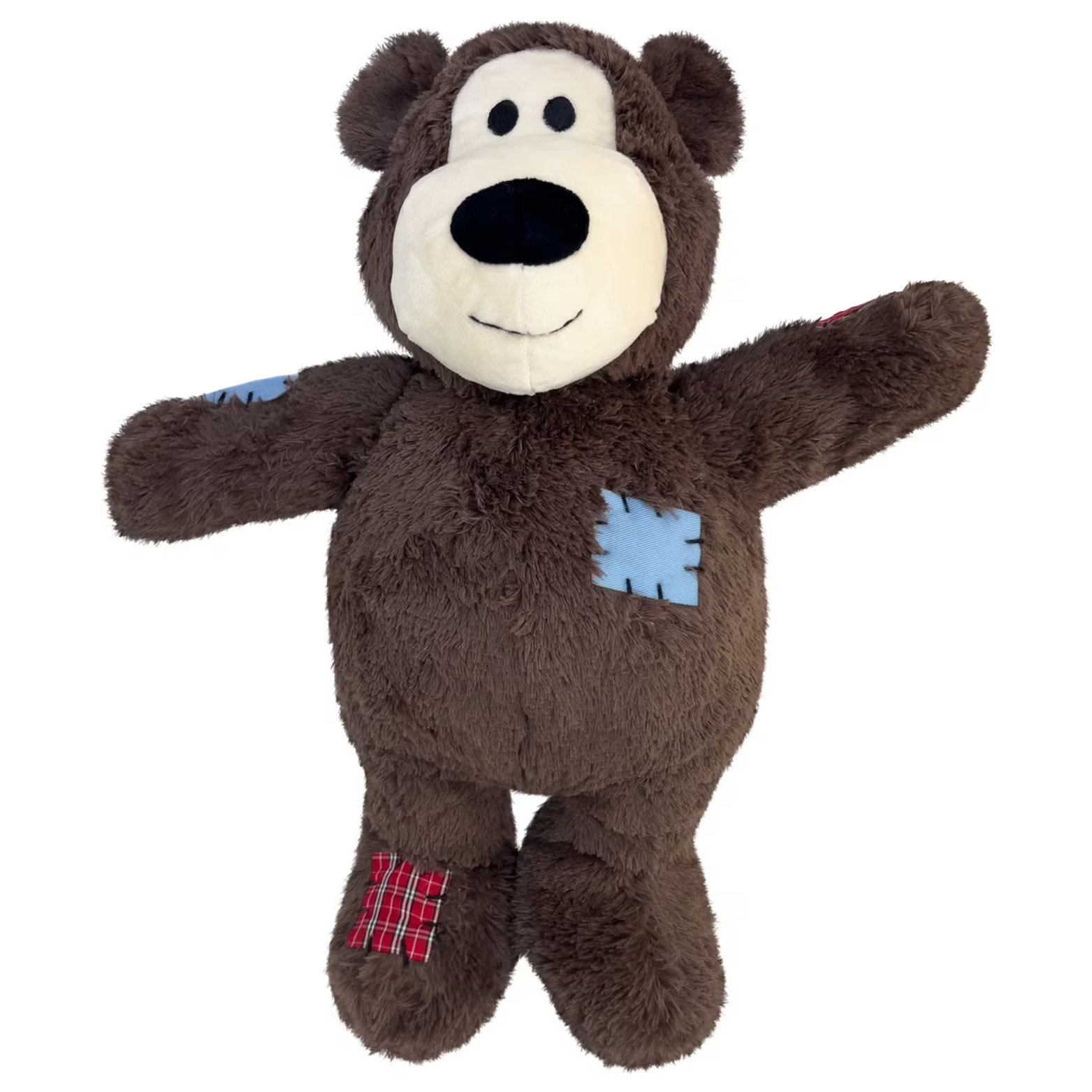 KONG Wild Knots Bear jumbo plush dog toy shown on a white background. Features a large brown plush bear with stitched patch details, soft fur exterior, and an outstretched arm and leg design for cuddling and play.