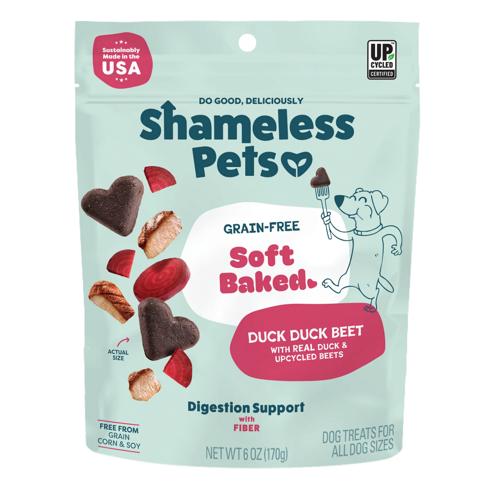 Front view of a light teal Shameless Pets dog treat bag labeled “Grain-Free Soft Baked Duck Duck Beet,” featuring heart-shaped dark brown treats, slices of red beets, and pieces of duck, with icons noting sustainably made in the USA, upcycled ingredients, digestion support with fiber, and dog treats for all dog sizes.
