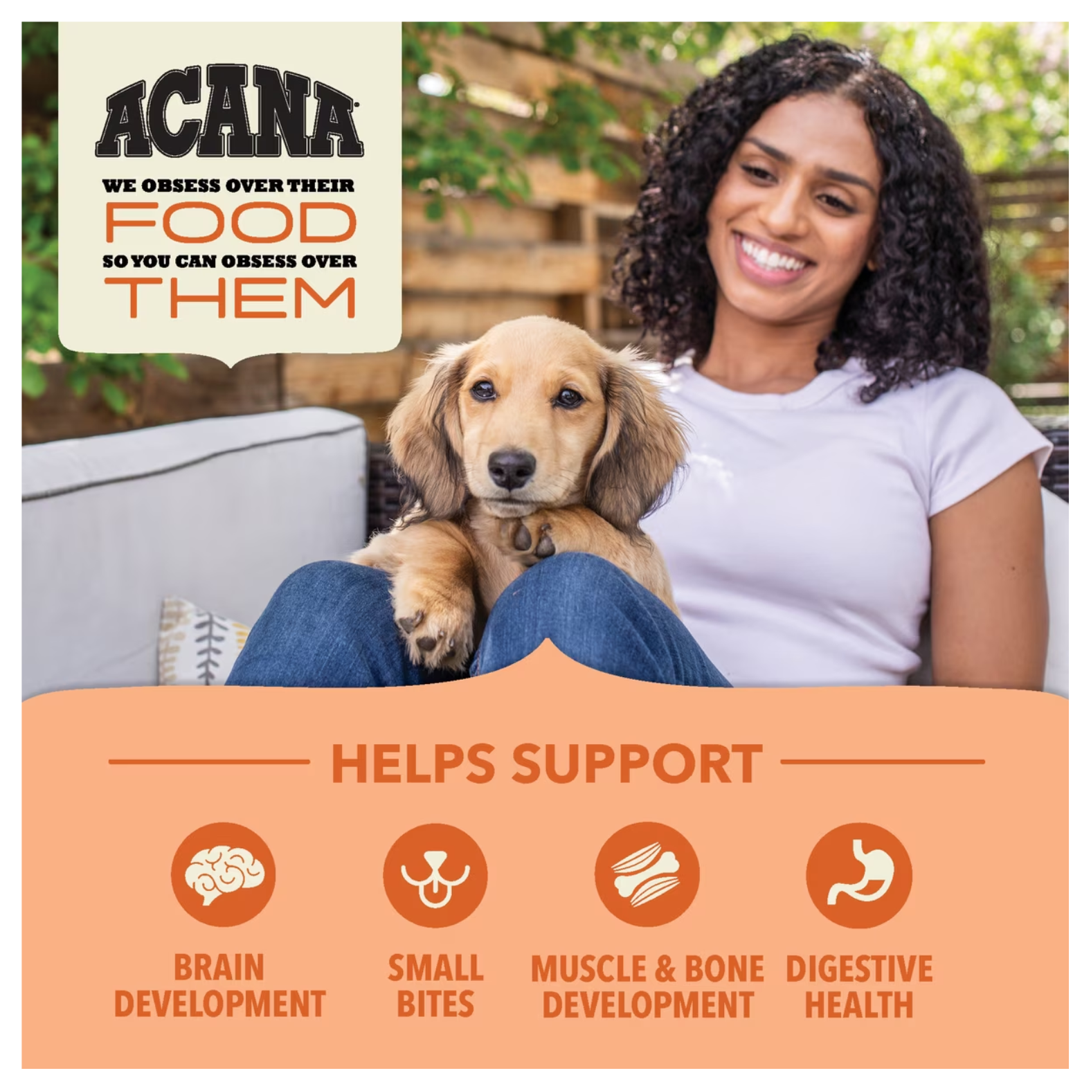 A smiling woman sitting outdoors holding a small puppy on her lap, with ACANA branding and text reading “We obsess over their food so you can obsess over them,” and icons indicating support for brain development, small bites, muscle and bone development, and digestive health.