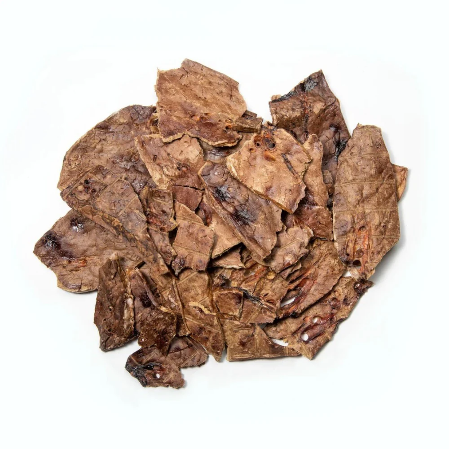 Pile of thin, irregularly shaped dehydrated beef lung slices in brown tones displayed on a light gray background.