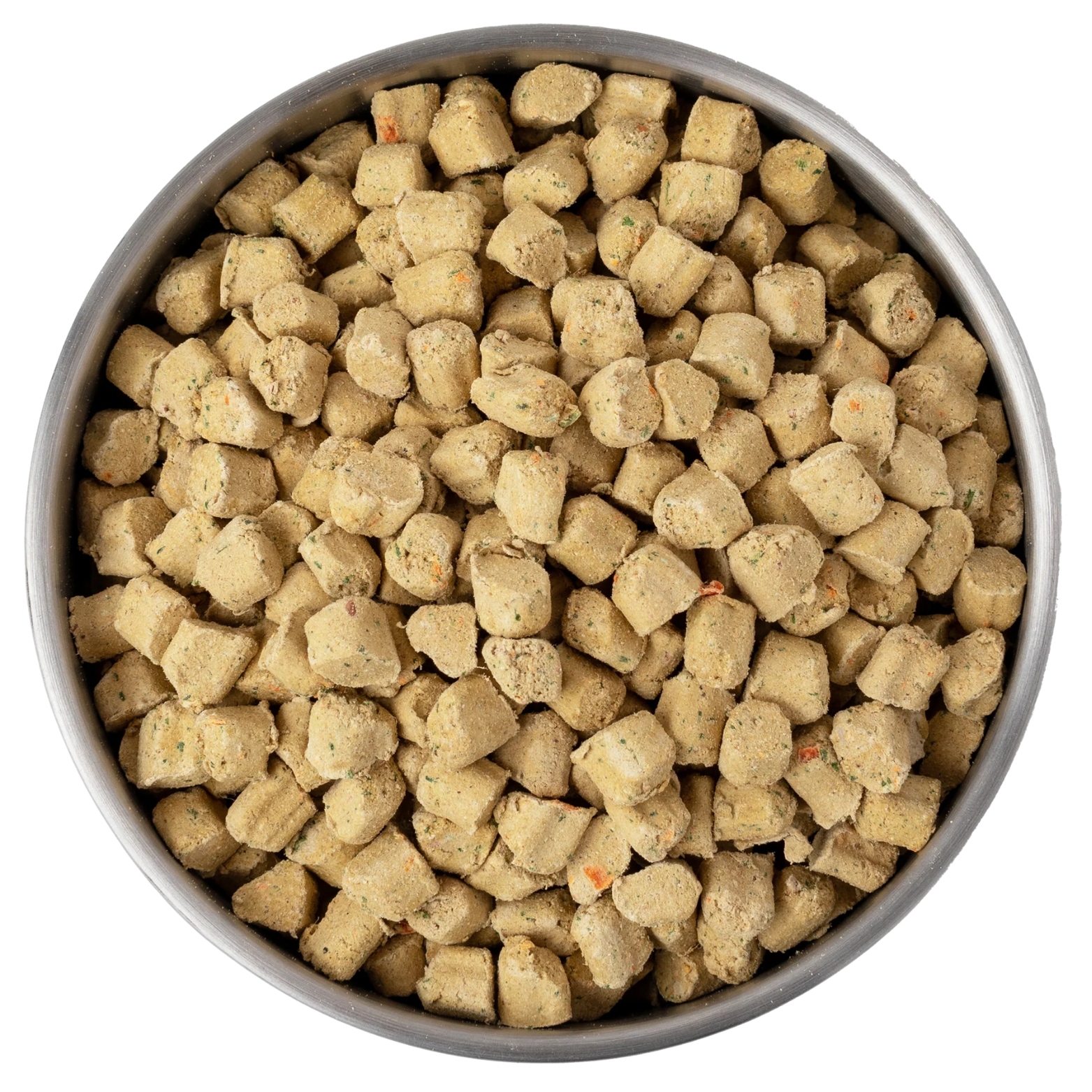 A metal dog bowl filled with small, cube-shaped freeze-dried dog food pieces. The nuggets are light tan with visible specks of vegetables and herbs.