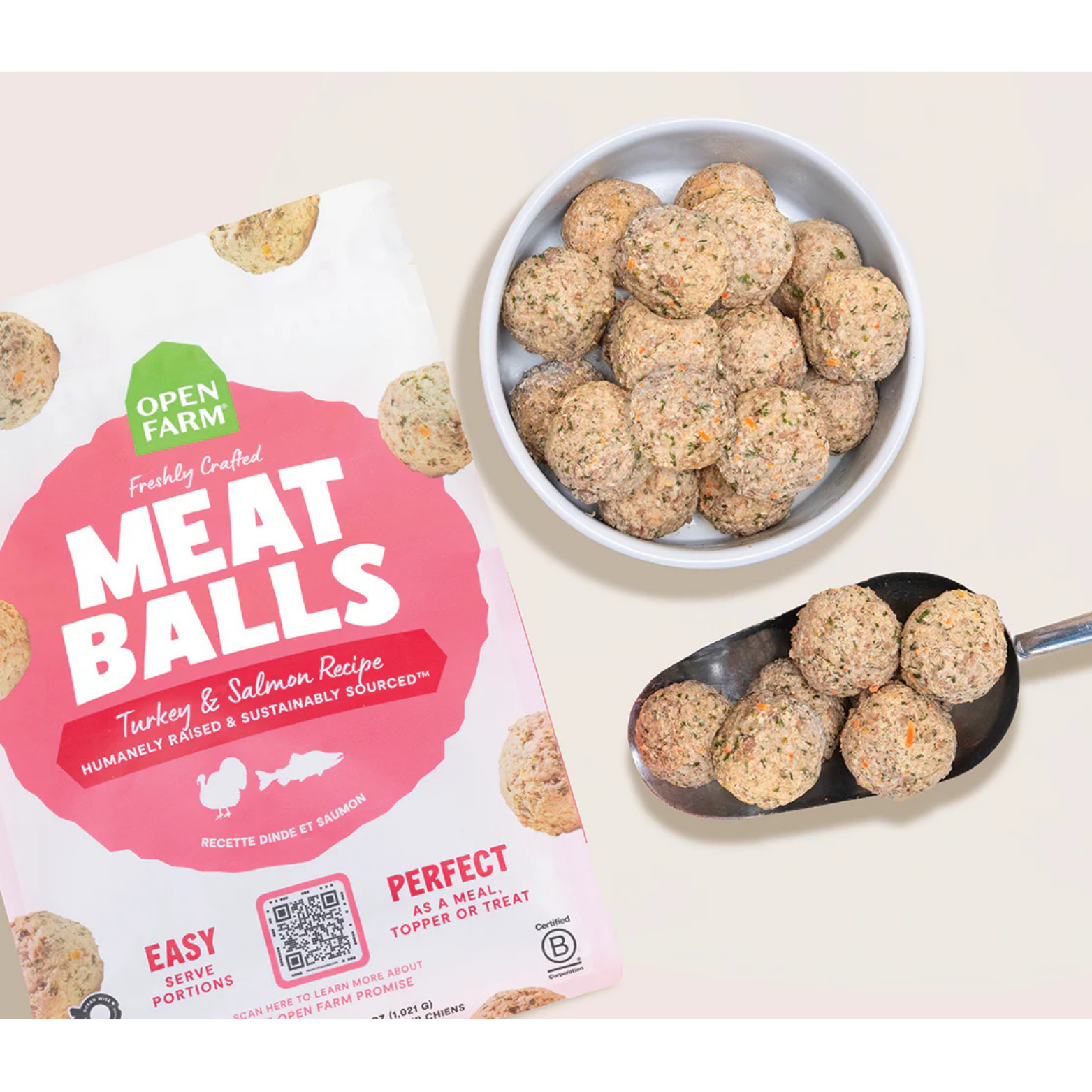 Open Farm meatballs packaging with a bowl and spoonful of meatballs on a light background